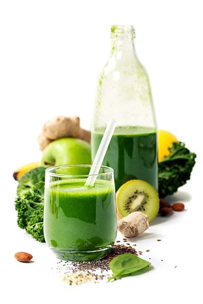 Green detox smoothie with fresh vegetables, representing natural detoxification support