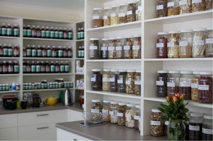 Lyme Natural dispensary interior with shelves of herbal medicines and natural remedies
